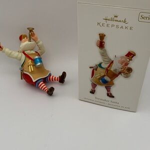 Hallmark Keepsake Toymaker Santa Ornament with Red and Gold Accents